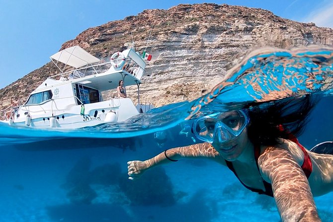 7 hours Boat trip to Lampedusa lunch, SUP and Snorkeling - What This Seven-Hour Boat Day Is Really Like