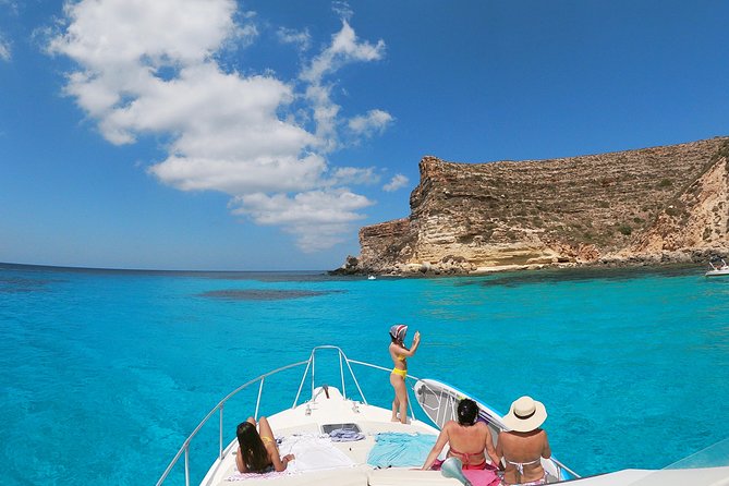 7 hours Boat trip to Lampedusa lunch, SUP and Snorkeling - La Tabaccara and the Clear Water