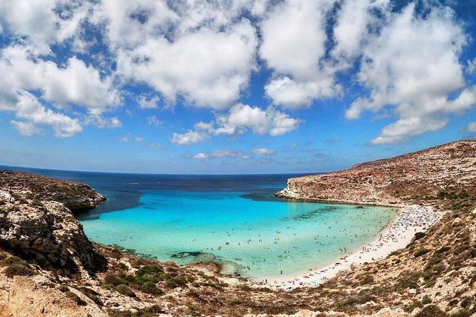 7 hours Boat trip to Lampedusa lunch, SUP and Snorkeling - Local Hosts and the Feel of the Day