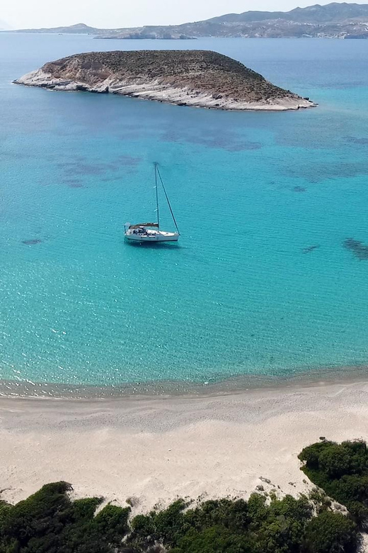 Adamantas: Full-Day Milos & Poliegos Boat Tour with Meals - Poliegos and the turquoise water at Gerakas