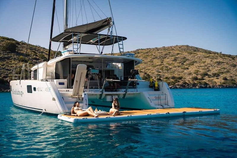 Agios Nikolaos: Sailing Trip Catamaran Lunch and Water Toys - Sailing past Elounda for the first hour