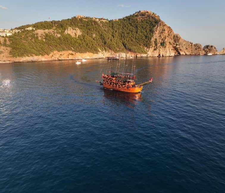 Alanya: Luxury Pirate Boat with Lunch & Unlimited Drinks - Alanya Castle and the Red Tower from the water