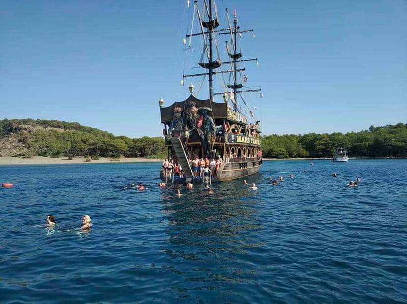 Alanya: Party Pirate Boat Trip w/Meal, Drinks, Pickup Option - Boarding a pirate ship with practical facilities