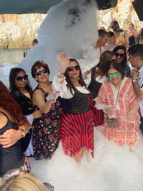 Alanya Pirate Boat: Lunch, Disco & Foam Party Included - Leaving Alanya Harbor with the castle on your left