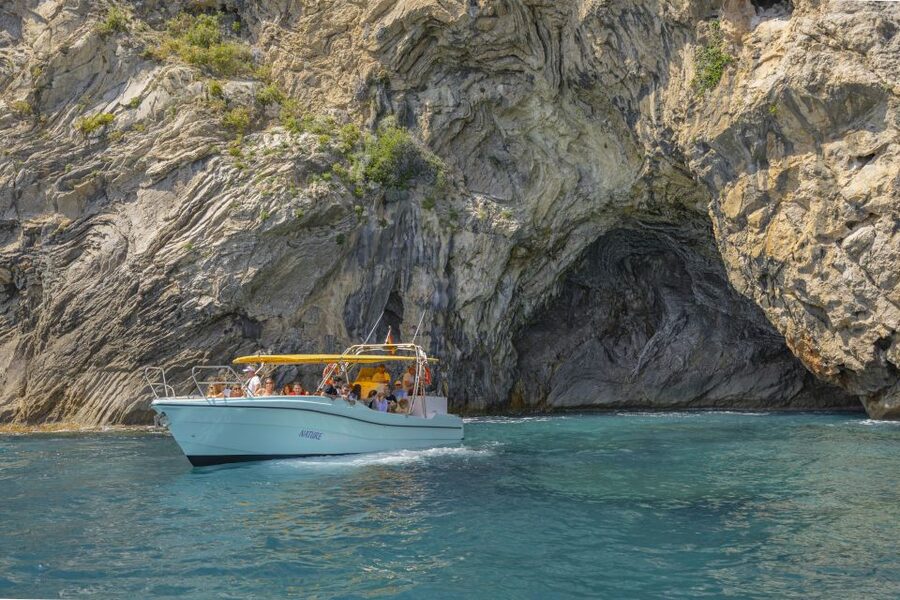 Alcudia: Coll Baix Beach & Sea Caves Cruise with Snorkeling - The crew, music, and onboard mood