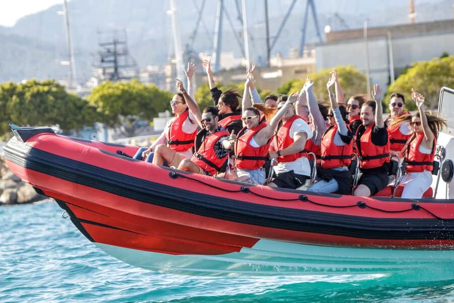 Alcudia: Sightseeing, Sea Caves & Snorkel Speedboat Tour - Coll Baix: Beach, Cliffs, and the First Swim