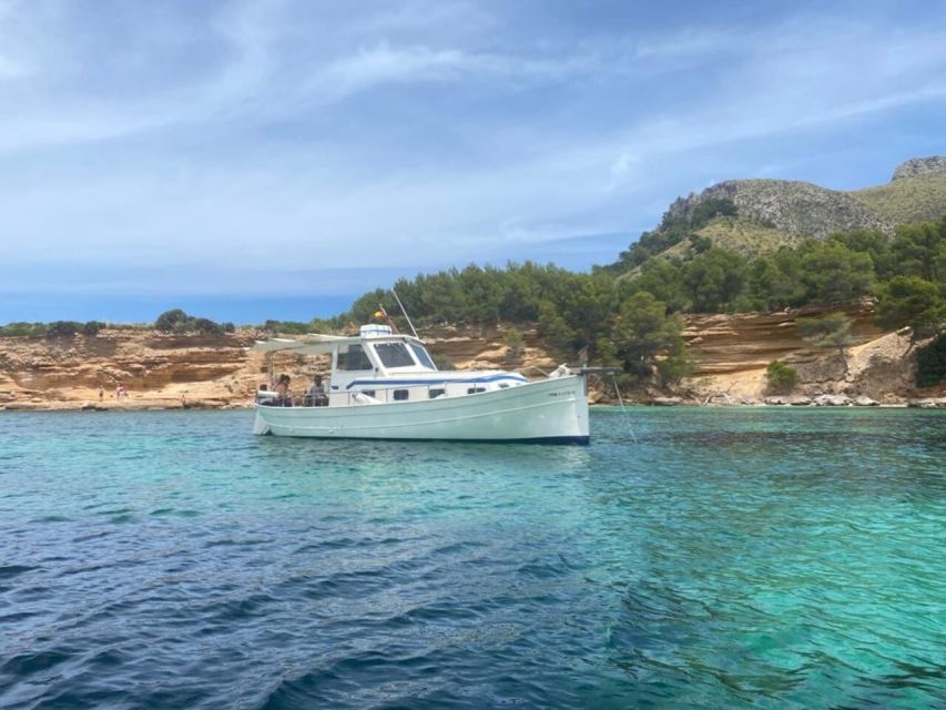 Alcudia: Traditional Wooden Boat Trip with Snorkeling - Leaving Port d’Alcúdia for the northern coast