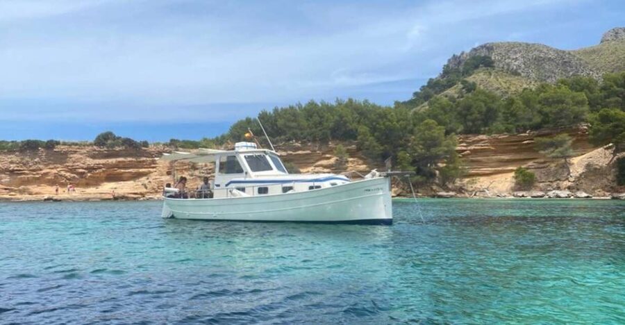 Alcudia: Traditional Wooden Boat Trip with Snorkeling - Coll Baix Beach: the main 45-minute stop