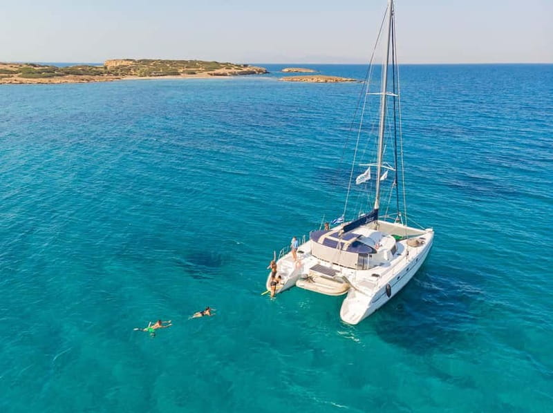 Athens: Half-Day Sunset Catamaran Cruise with Meal & Drinks - Swimming stops in clear water