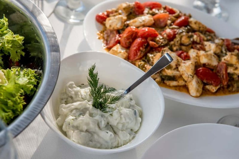 Athens: Half-Day Sunset Catamaran Cruise with Meal & Drinks - A Greek meal prepared in the small galley