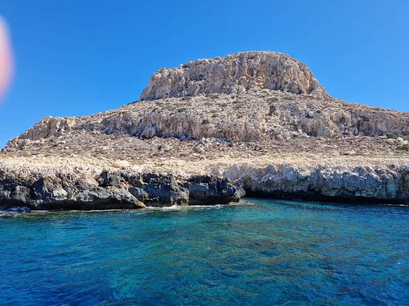 Ayia Napa: Lazy Day Cruise, Turtle Cove, Blue Lagoon & Lunch - Sea caves and Cape Greco from the water