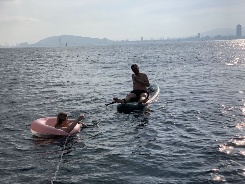 Barcelona: 2-Hour Sailboat Tour with Paddle Boarding - What the crew adds to the experience