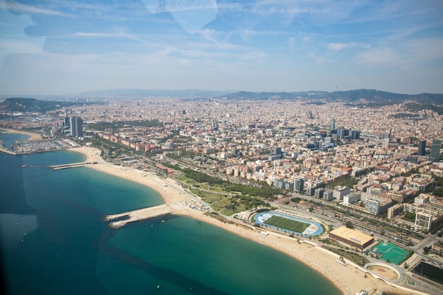 Barcelona: Boat Trip and Panoramic Helicopter Flight - Weather, timing, and cancellation risks
