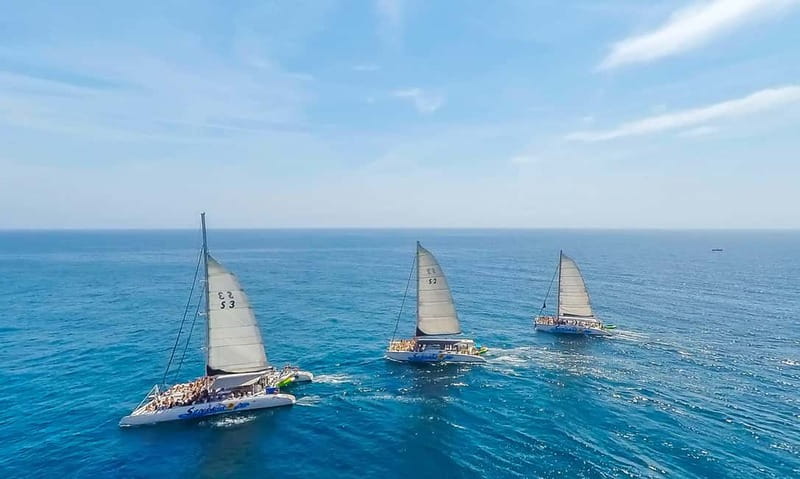 Barcelona: Catamaran Party Cruise with BBQ Meal - The first hour: Barcelona from the water