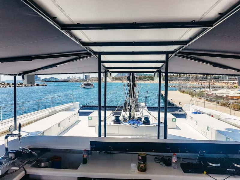 Barcelona: Catamaran Party Cruise with BBQ Meal - Swimming near Badalona