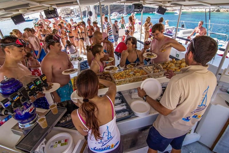 Barcelona: Catamaran Party Cruise with BBQ Meal - Music, dancing, and the return cruise