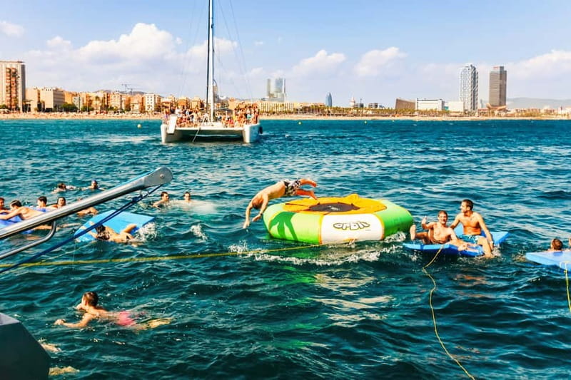 Barcelona: Catamaran Party Cruise with BBQ Meal - Finding the beach meeting point at Port Olímpic