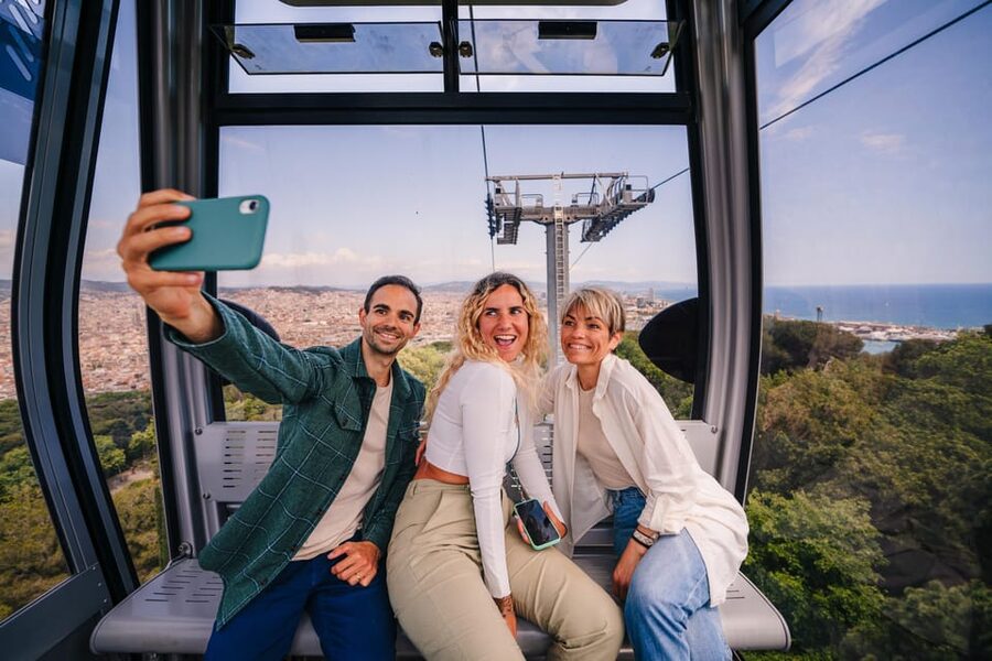 Barcelona: E-Bike Tour with Montjuic Cable Car & Boat Ride - Taking the funicular up Montjuïc Mountain