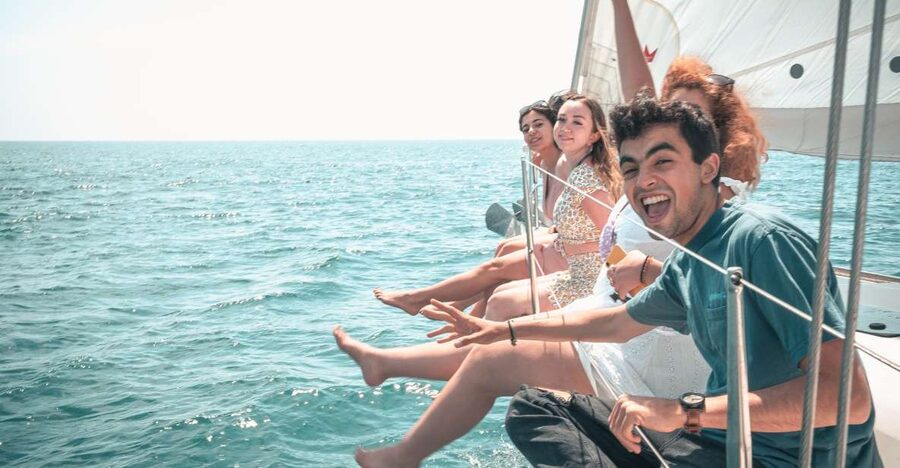 Barcelona: Midday or Sunset Sailing with Open Bar and Snacks - Barcelona from three to four miles offshore