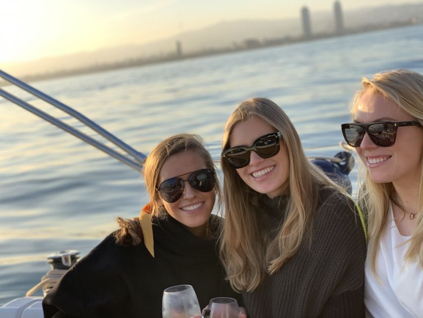 Barcelona: Midday or Sunset Sailing with Open Bar and Snacks - Open bar, snacks, and the small-boat atmosphere
