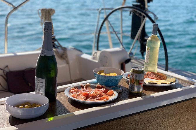 Barcelona Sailing: Light Snacks & Open Bar with Private Option - Open water, skyline views, and the feel of the sail