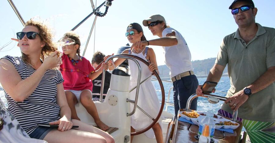 Barcelona: Sailing Tour with Spanish Tapas and Drinks - The swim stop and what conditions can change