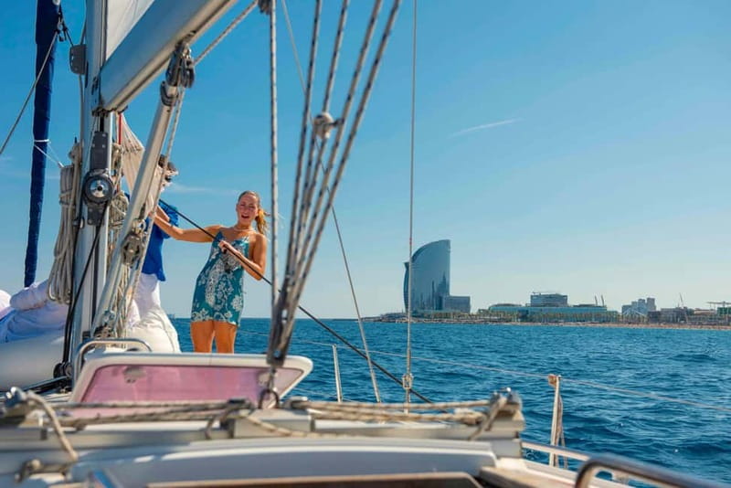Barcelona: Sailing Tour with Young Local Captain & Drinks - Port Vell: super-yachts and the old harbor entrance