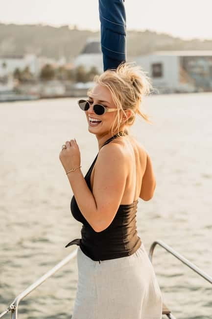 Barcelona: Sailing Tour with Young Local Captain & Drinks - Captains, group size, and the mood on board