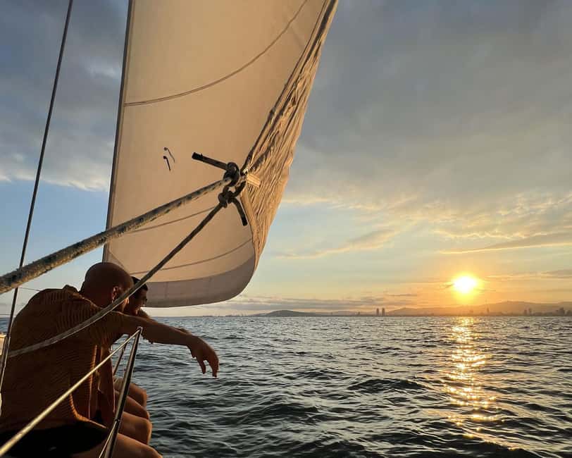 Barcelona: Sailing with Open Bar, Catalan Snack & Swim Stop - The swim stop, paddle boards, and water toys