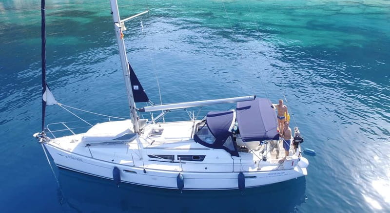 Barcelona: Sunset Boat Trip with Cava Wine and Snacks - What the skippers add to the experience