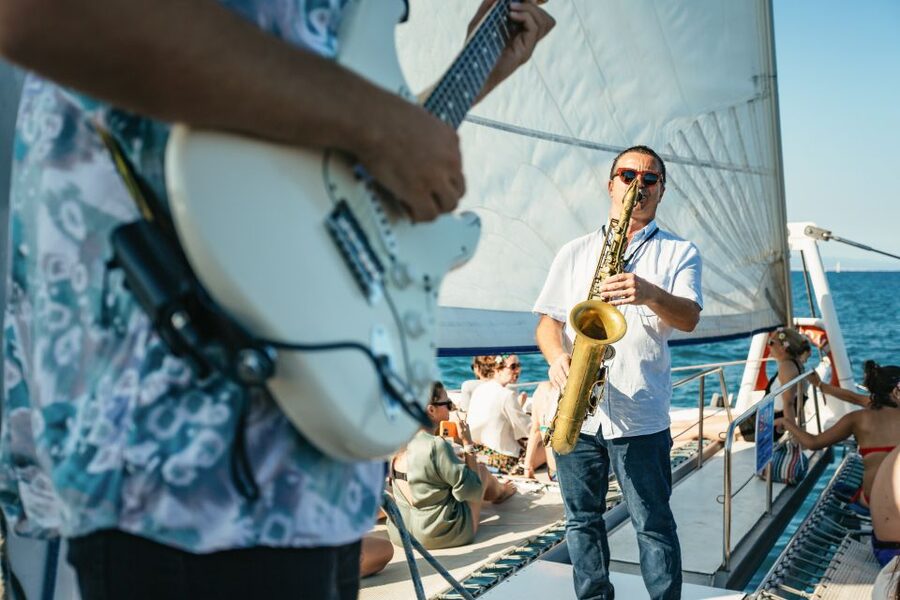 Barcelona: Sunset Catamaran Cruise with Live Music - Sailing out along the Barcelona coast