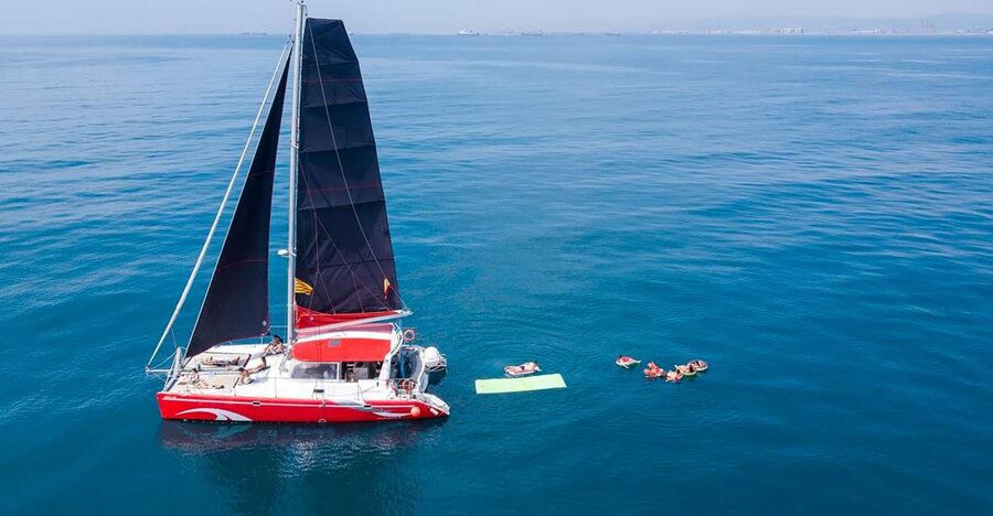 Barcelona: Sunset or Day Catamaran Cruise with Tapa & Drink - Starting at Marina Vela beside Barceloneta