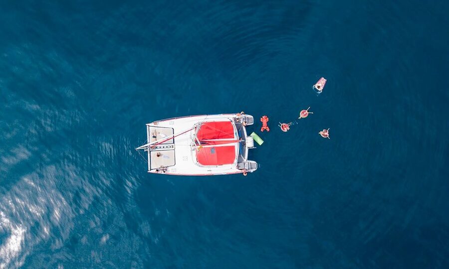 Barcelona: Sunset or Day Catamaran Cruise with Tapa & Drink - How the crew shapes the experience