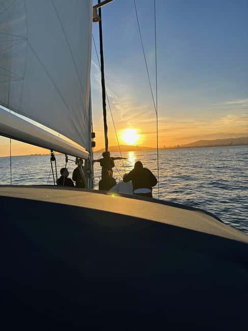 Barcelona: Sunset Sailboat Cruise with Open Bar and Snacks - The captain can shape the whole evening