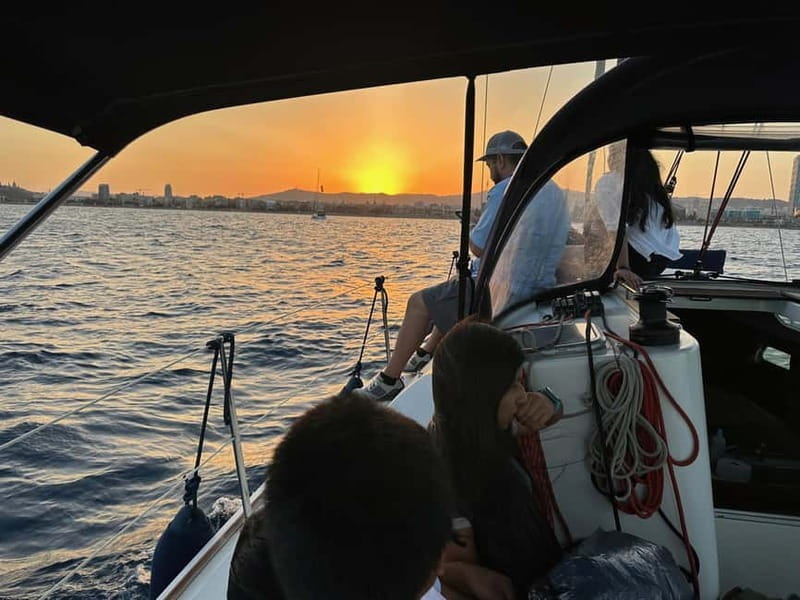Barcelona: Sunset Sailboat Cruise with Open Bar and Snacks - What the return to Olympic Port feels like
