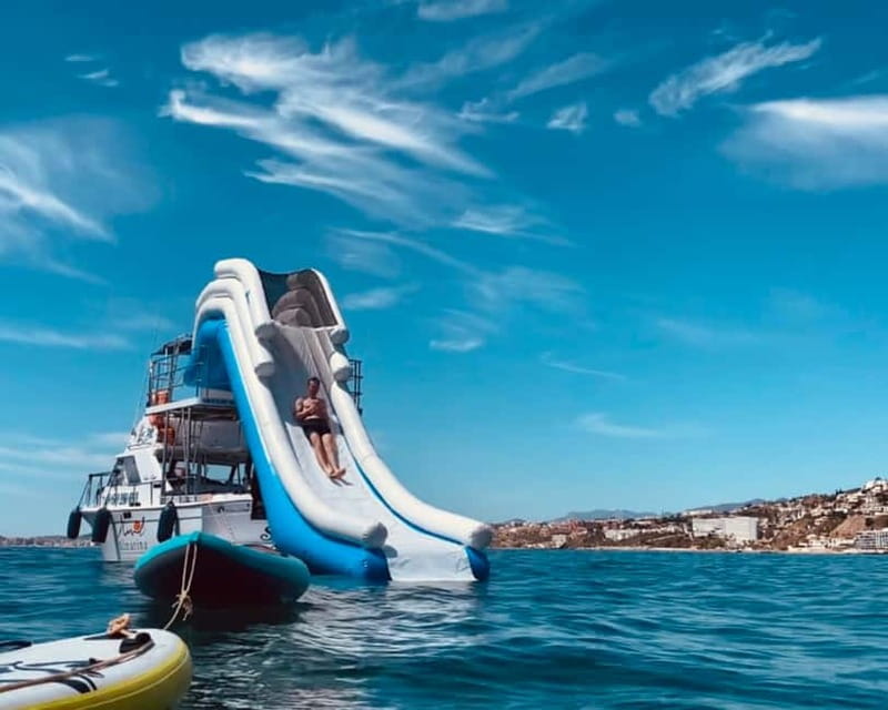 Benalmádena Boat Tour with Snorkeling, Water Slide and Lunch - Setting out from Benalmádena with a small crew