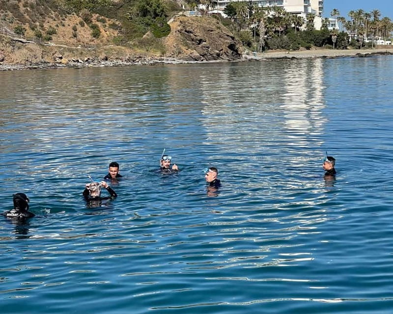 Benalmádena Boat Tour with Snorkeling, Water Slide and Lunch - Swimming, jumping, and the 20-foot water slide