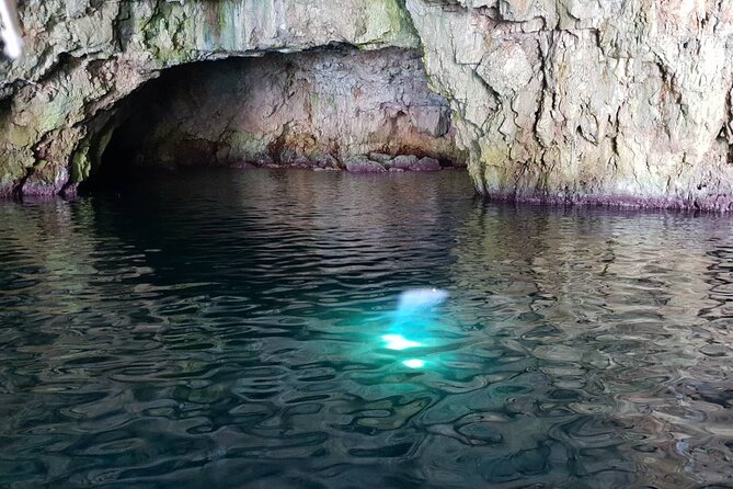 Blue Cave & Vis Island speedboat tour from Hvar - Stiniva Cove and its steep walls