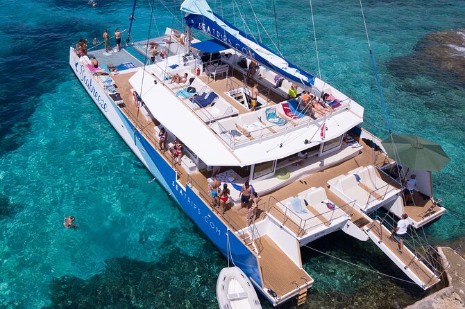 Blue Lagoon, Beaches and Bays Catamaran Sailing Tour - Life onboard: comfortable, lively, and not especially quiet