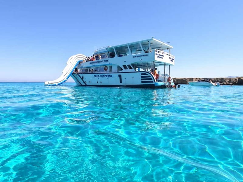 Blue Lagoon Cruise: Waterslide Adventure from Latchi Harbour - What the boat offers between swims