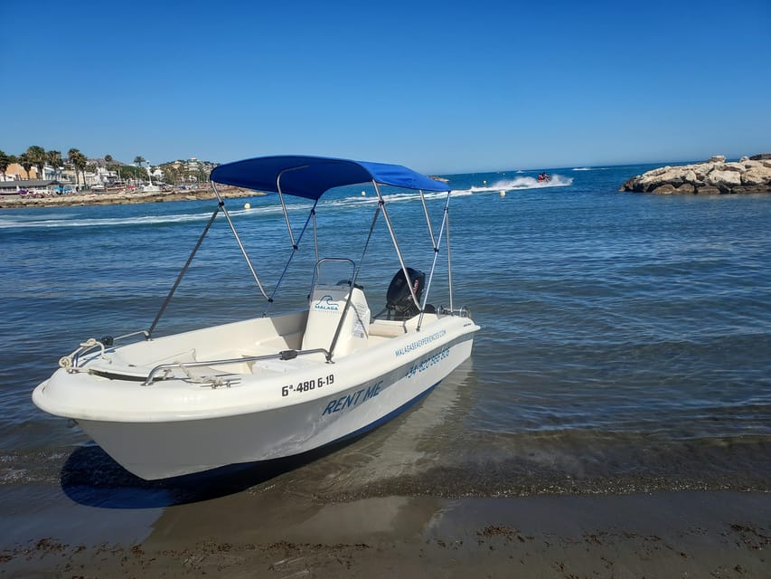 Boat rental without a license in Malaga city for 1-6 people. - The boat briefing and first turn at the controls