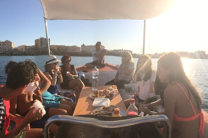 Boat tour of Ortigia Island and sea caves - Boat comfort, spray, and changing sea conditions