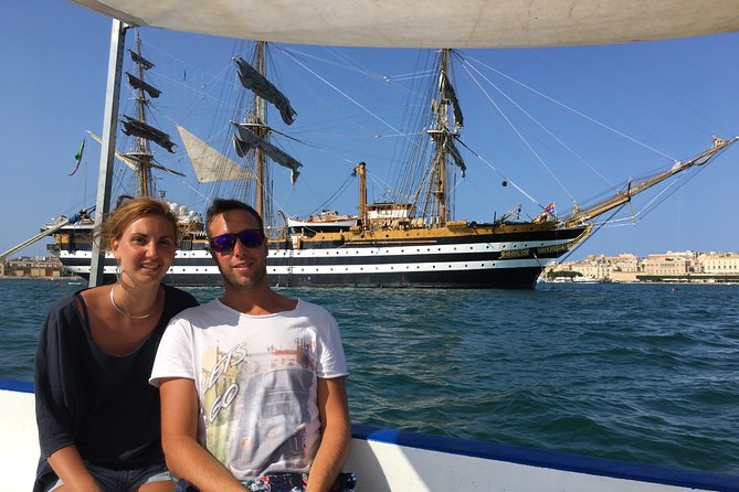 Boat tour of Ortigia Island and sea caves - Guides who shape the experience