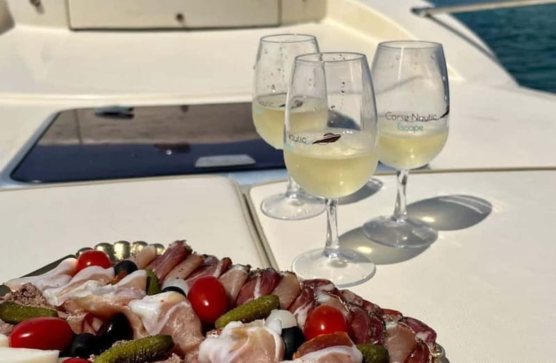 Bonifacio: Sunset Aperitif Dining Boat Tour - Leaving Bonifacio Port for the evening