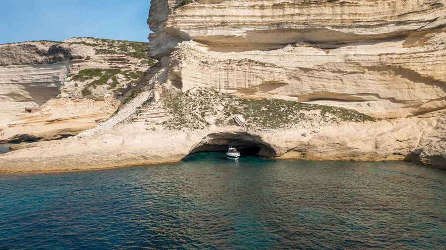 Bonifacio: Sunset Aperitif Dining Boat Tour - Sunset, caves, and the changing Bonifacio cliffs