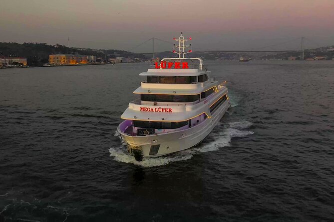 Bosphorus Dinner Cruise with Show and Private Table - Maiden’s Tower, Galata Tower, and Istanbul after sunset