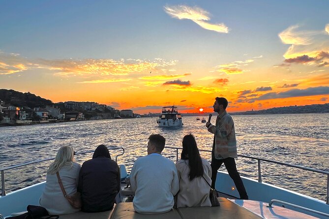Bosphorus Sunset or Daytime Yacht Cruise with Snacks & Live Guide - Maiden’s Tower and Galata Tower in the sunset light