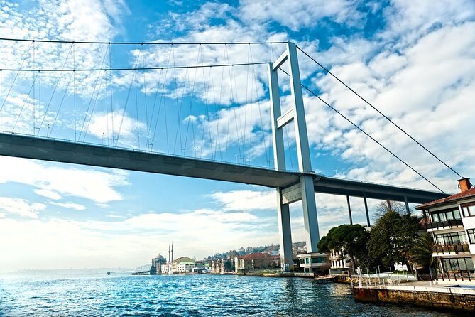 Bosphorus Sunset or Daytime Yacht Cruise with Snacks & Live Guide - Dolmabahçe Palace and the European shore