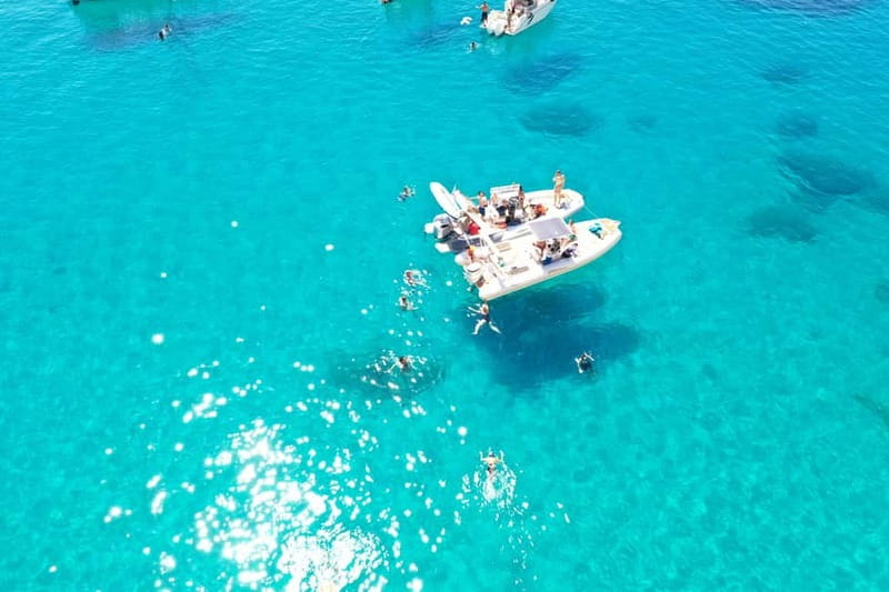 Cagliari: Boat Tour, 4 Stops, Swim, Snorkeling, & 1 Spritz - From Bacan to the cruise port and dolphin watch