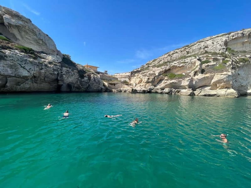 Cagliari: Boat Tour with 4 Swim Stops, Snorkeling & Prosecco - What the RIB ride feels like